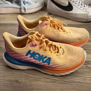 Hoka Orange and Blue Athletic Shoes